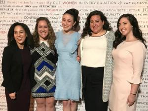Five winners of the NYWICI scholarships pose arm in arm