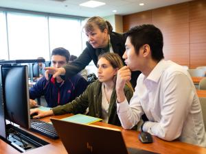 students work on projects in an accounting analytics class