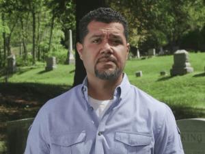 A man in a cemetery