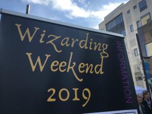 A sign reading "Wizarding Weekend 2019"