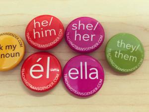 Colorful buttons with pronouns on them