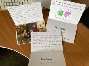 Several holiday cards on a desk