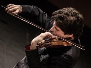 A man playing a violin