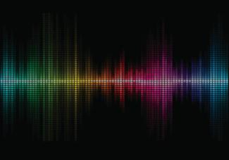 Artistic render of sound waves in multiple colors.