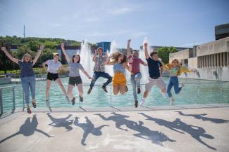 Students jumping for joy.