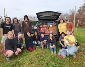 Students in the Innovation Scholars Program enjoy a field trip to an apple orchard