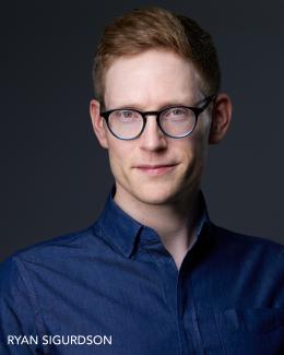 Headshot of a white man in a blue shirt and glasses. His name "Ryan Sigurdson" appears in the lower left corner.