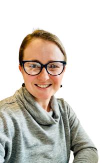 Headshot of adult woman with glasses