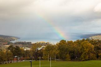 A rainbow in a fall skyline. 