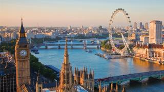 View of London from above, showing the River Thames, Big Ben, and the London Eye