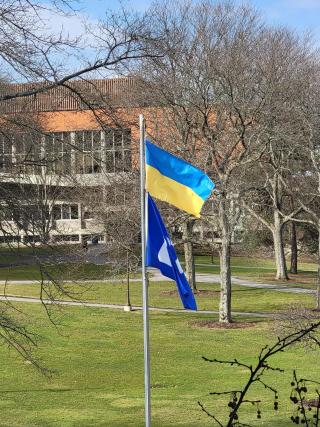 Flag of Ukraine flying outside campus center