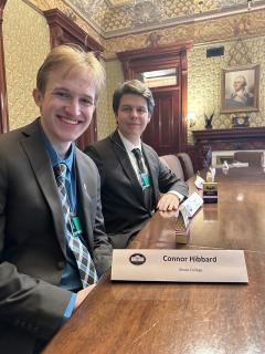 WICB Station Manager Connor Hibbard '23 and VIC Radio Station Manager Andy Tell '23 inside the Secretary of War Room in the Eisenhower Executive Office Building.