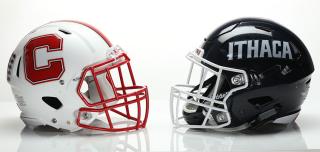 Image of Cortland and Ithaca helmets facing each other on white background. Cortland helmet is on the left and Ithaca helmet is on the right.