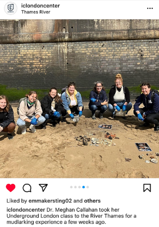 Dr. Meghan Callahan with a group of Ithaca College London Center students, posing beside the Thames River while "mudlarking" on the shores of the river.