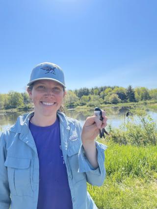 person holding a bird