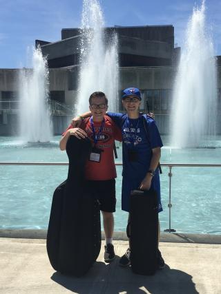 Alex and his brother in front of the fountains.