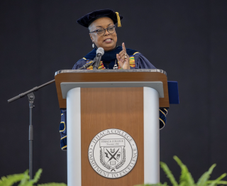 President Cornish speaking at a lectern